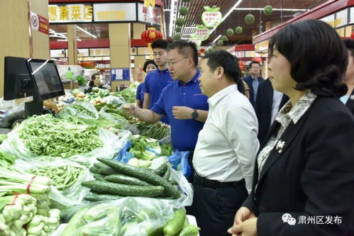 肃州区委书记何正军在春光农产品市场有限责任公司调研